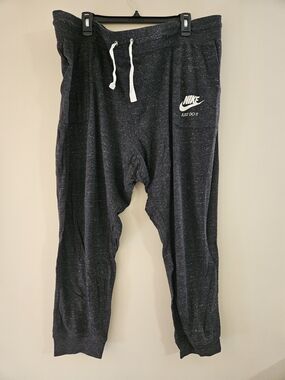 Women's Black Heather Nike Joggers with White Drawstring & Logo Patch